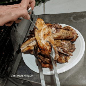 Checking the temperature for this easy and healthy grilled chicken