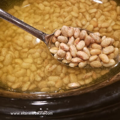Love this easy, slow cooker pinto beans recipe that's healthy and budget-friendly too. 